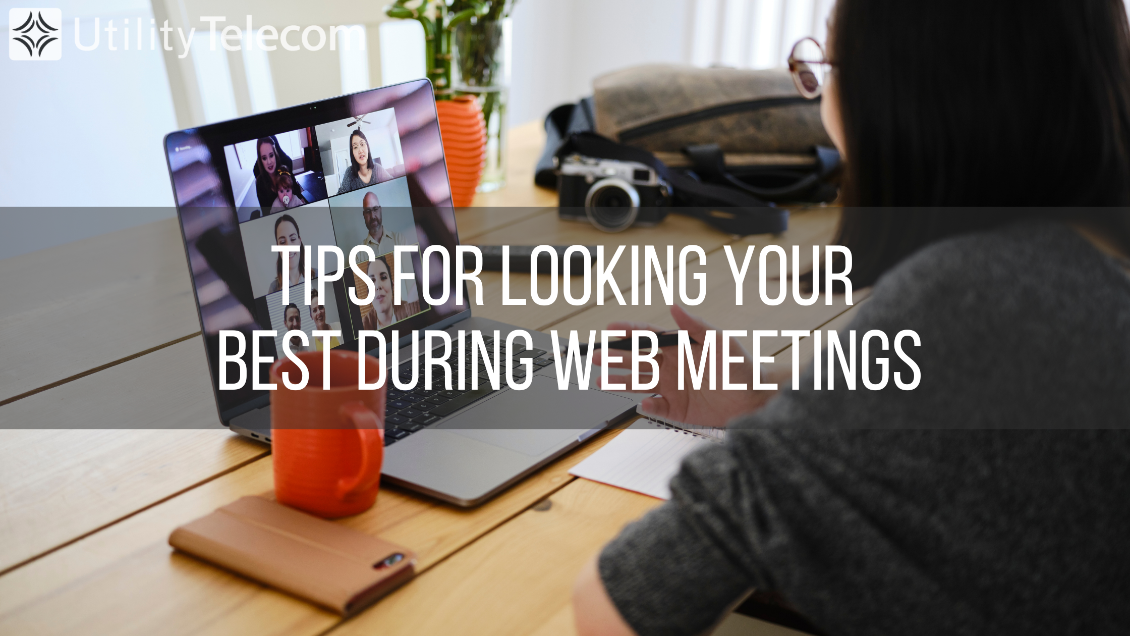 Woman looking at laptop during a web conference with a text overlay that reads "Tips for looking your best during web meetings"